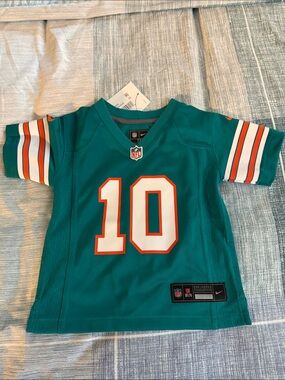 Nike Kids Teal Dolphins Football Jersey #10 with White & Orange Accents